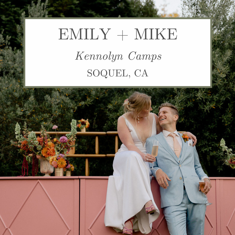 Wedding couple laughing at outdoor venue